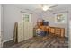 Versatile room with natural light, ideal for storage or a home office, with ample storage space at 22025 Torrence Chapel Rd, Cornelius, NC 28031