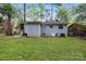 View of backyard with exterior of home at 2815 Grimes St, Charlotte, NC 28206