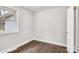 Bright bedroom features neutral walls and dark laminate flooring at 2815 Grimes St, Charlotte, NC 28206