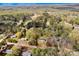 Aerial view showcases the property within a serene neighborhood, bordered by lush greenery and trees at 2895 Sweeping Pine Ln, Denver, NC 28037
