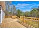 Spacious wood deck with modern railings is perfect for outdoor entertaining at 2895 Sweeping Pine Ln, Denver, NC 28037