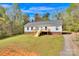 Charming home with a well-manicured lawn and a welcoming front deck at 2895 Sweeping Pine Ln, Denver, NC 28037