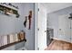 Mudroom features a bench, laundry guide, and shelving for pet supplies at 2895 Sweeping Pine Ln, Denver, NC 28037