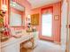 Unique bathroom featuring red and white striped wallpaper and vanity with matching chair at 316 Country Club Acres None, Shelby, NC 28150