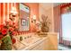 Bathroom featuring red and white striped wallpaper and traditional style sink and fixtures at 316 Country Club Acres None, Shelby, NC 28150