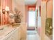 Bathroom featuring red and white striped wallpaper and shower with glass door at 316 Country Club Acres None, Shelby, NC 28150