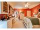 Cozy bedroom with bright floral wallpaper, built-in shelving, and vintage furnishings at 316 Country Club Acres None, Shelby, NC 28150
