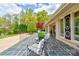 Home featuring a spacious front patio with seating area and mature landscaping at 316 Country Club Acres None, Shelby, NC 28150