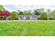 Charming home exterior featuring a well-manicured lawn and inviting front entrance at 316 Country Club Acres None, Shelby, NC 28150