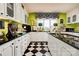 Bright kitchen showcasing a black and white checkered floor and green accent walls at 316 Country Club Acres None, Shelby, NC 28150