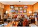 Cozy living room featuring wood paneled walls, warm lighting, and comfortable seating at 316 Country Club Acres None, Shelby, NC 28150