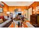 Comfortable living room featuring a work station, wood paneled walls and neutral colored couch at 316 Country Club Acres None, Shelby, NC 28150