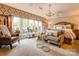 Serene bedroom features a sitting area, large windows, and elegant chandelier lighting at 316 Country Club Acres None, Shelby, NC 28150