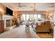 Serene bedroom features a sitting area, fireplace, large windows, and elegant chandelier lighting at 316 Country Club Acres None, Shelby, NC 28150