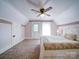 Bright bedroom featuring plush carpet, charming wallpaper, a cozy bed, and plenty of natural light at 3241 Long Shoals Rd, Lincolnton, NC 28092