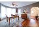 Dining room with hardwood floors, decorative wallpaper, and a wooden dining table at 3241 Long Shoals Rd, Lincolnton, NC 28092