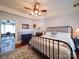 Inviting bedroom with hardwood floors, fireplace, and access to a dining area at 3241 Long Shoals Rd, Lincolnton, NC 28092