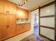 Functional mudroom featuring ample cabinet space and a sliding barn door at 3241 Long Shoals Rd, Lincolnton, NC 28092