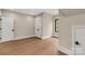 A bright bedroom with wood flooring, high ceilings, base molding and a window offering picturesque views of the outdoors at 3268 Sherman Dr, Lancaster, SC 29720