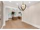 Open kitchen features an island, modern appliances and pendant lighting at 3268 Sherman Dr, Lancaster, SC 29720