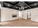 Living room featuring an electric fireplace and sliding barn door at 3268 Sherman Dr, Lancaster, SC 29720