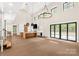 Open concept space features a modern kitchen, large windows, and seamless indoor-outdoor living at 3268 Sherman Dr, Lancaster, SC 29720