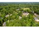 Expansive residential area surrounded by dense green tree canopy at 3622 Roxburgh Ln, Gastonia, NC 28056
