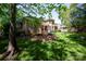 Expansive brick home with well-maintained lawn, landscaping and outdoor living space at 3622 Roxburgh Ln, Gastonia, NC 28056