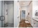 This stylish bathroom features a walk-in shower, ample storage, and neutral tones that create a serene and functional space at 3622 Roxburgh Ln, Gastonia, NC 28056