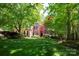 Beautiful brick home with mature trees, lush lawn and landscaping at 3622 Roxburgh Ln, Gastonia, NC 28056