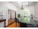 Elegant living room with a piano, beautiful floors, and a staircase at 3622 Roxburgh Ln, Gastonia, NC 28056