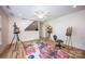 Studio space with easels, artworks, and a floral rug on a hardwood floor at 3622 Roxburgh Ln, Gastonia, NC 28056