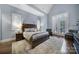 Bright bedroom with a large bed and french doors at 4071 Poplar Ridge Dr, Fort Mill, SC 29715