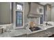 This kitchen showcases modern appliances, gray cabinetry, and a sleek design with counter space at 4071 Poplar Ridge Dr, Fort Mill, SC 29715