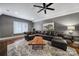 Cozy living room with leather sectional sofa, coffee table, and stylish decor at 4071 Poplar Ridge Dr, Fort Mill, SC 29715