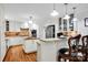 Bright kitchen with stainless steel appliances, granite countertops, and a breakfast bar, great for cooking and entertaining at 4937 Broken Saddle Ln, Charlotte, NC 28226