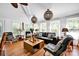Comfortable living room with hardwood floors, neutral colors, and modern furnishings, creating a relaxing space at 4937 Broken Saddle Ln, Charlotte, NC 28226