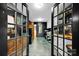 Office space featuring modern finishes and storage, as seen through stylish glass paneled doors at 4937 Broken Saddle Ln, Charlotte, NC 28226