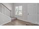 The entryway features hardwood floors and a staircase leading to the upper level at 5345 Cherrie Kate Ct # 1804, Stanley, NC 28164