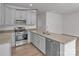 Modern kitchen featuring stainless steel appliances, granite countertops, and ample cabinet space at 5345 Cherrie Kate Ct # 1804, Stanley, NC 28164