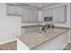 Modern kitchen featuring stainless steel appliances, granite countertops, and ample cabinet space at 5345 Cherrie Kate Ct # 1804, Stanley, NC 28164