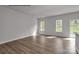 Spacious living room featuring hardwood floors and ample natural light at 5345 Cherrie Kate Ct # 1804, Stanley, NC 28164