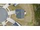 Aerial view of a home showing the roof, driveway, and surrounding landscaping at 5861 Camp Sw Ct, Concord, NC 28025