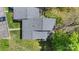 An aerial view shows a well-maintained roof and lush green yard surrounding the home at 6605 Point Comfort Ln, Charlotte, NC 28226
