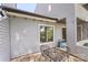 Charming back porch with outdoor dining set, perfect for enjoying meals outside at 6605 Point Comfort Ln, Charlotte, NC 28226