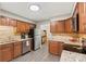 Kitchen with modern appliances and breakfast area at 6605 Point Comfort Ln, Charlotte, NC 28226