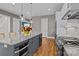 Modern kitchen featuring granite countertops, stainless steel appliances, and an island with extra storage at 6743 Fox Ridge Cir, Davidson, NC 28036