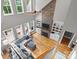Inviting living room with a stone fireplace, built-in shelves, and a comfortable seating area bathed in natural light at 6743 Fox Ridge Cir, Davidson, NC 28036