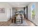 Cozy dining room with modern furniture, neutral colors, and a view to the backyard at 7108 Brookview Ln, Sherrills Ford, NC 28673