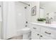 Bathroom featuring a shower with white subway tile, a vanity, and modern fixtures at 8221 Pineville Matthews Rd # A, Charlotte, NC 28226